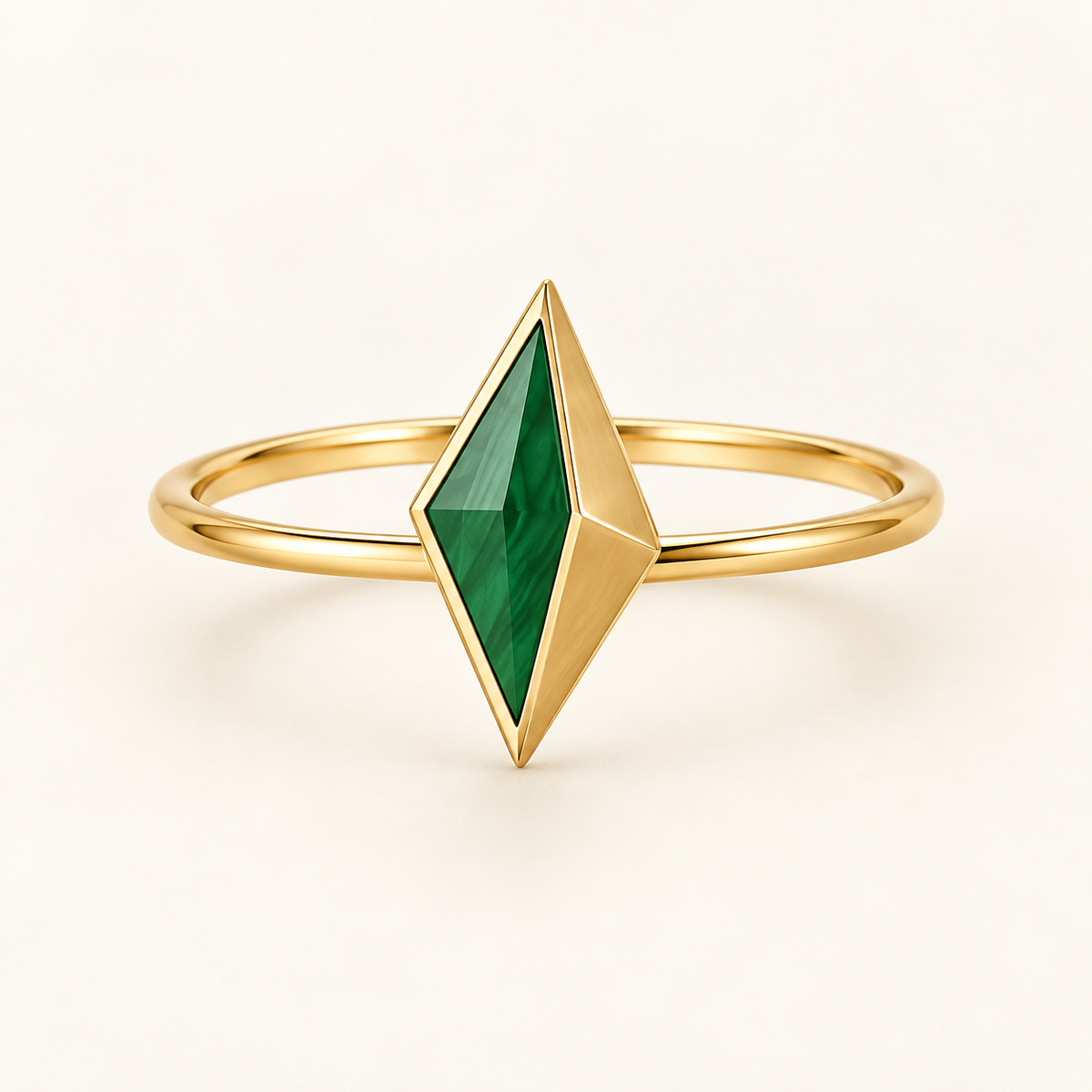 Zafira Emerald Spear Ring, a green, gold geometric ring