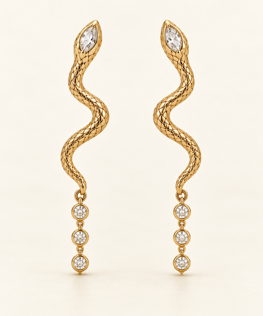 Moirai Asymmetric Serpent Earrings, gold-finished snake drops with three- and four-crystal tails