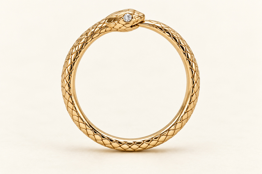 Aeternum Ouroboros Bangle, circular gold-finished snake bracelet with a round clear crystal accent