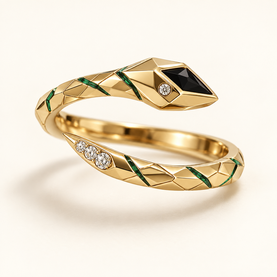 Apophis Verdant-Fang Serpent Bangle, faceted gold-finished snake bracelet with black, green, and clear crystal accents